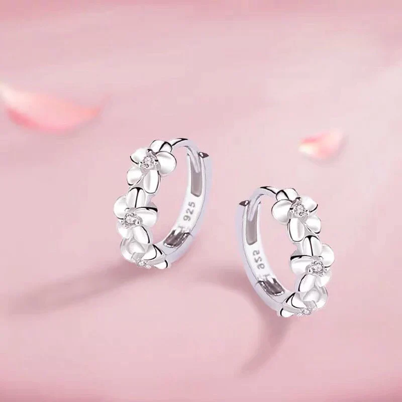 Elegant Silver Earrings with Floral Design - Image 3