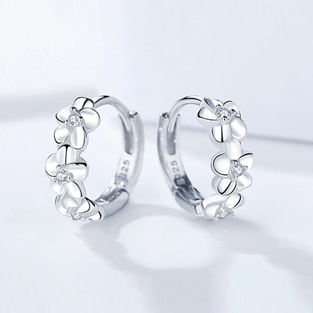Elegant Silver Earrings with Floral Design - Image 4